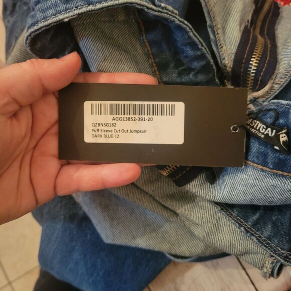 Nasty Gal Cut Out Denim Flare Jeans Jumpsuit size 8 Puff Long Sleeve Dark Blue - Picture 10 of 10